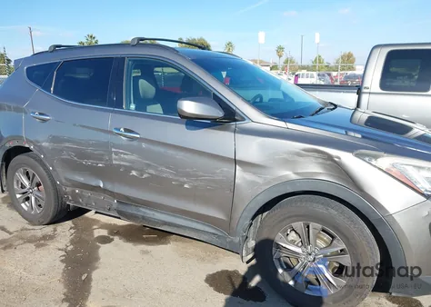 2016 Hyundai Santa Fe Sport 2.4L z USA, uszkodzony, nr VIN 5XYZU3LB1GG333113